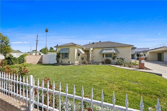 ranch-style home with a front lawn