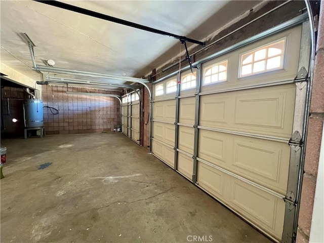 garage featuring strapped water heater