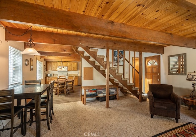 interior space with wood ceiling and beam ceiling