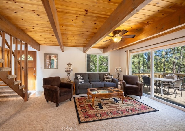 living room with wooden ceiling, beamed ceiling, ceiling fan, and light colored carpet