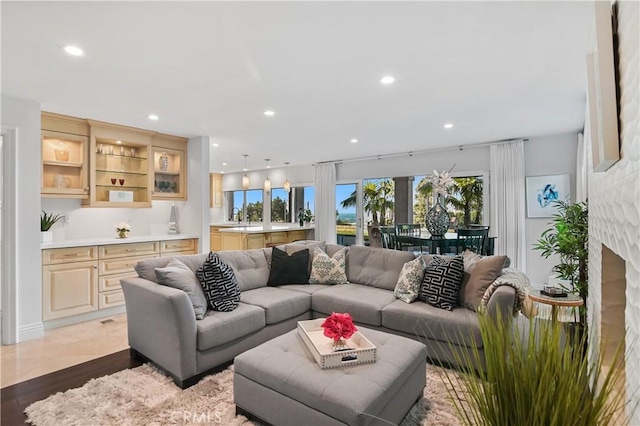 living room featuring light wood-style floors and recessed lighting