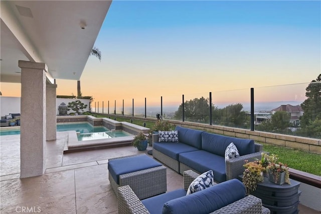 view of patio / terrace featuring a fenced in pool, an in ground hot tub, fence, and an outdoor hangout area