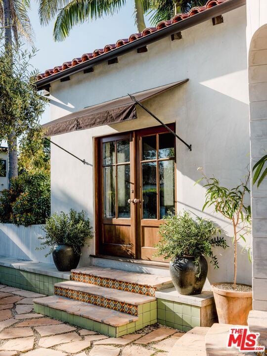 property entrance with french doors