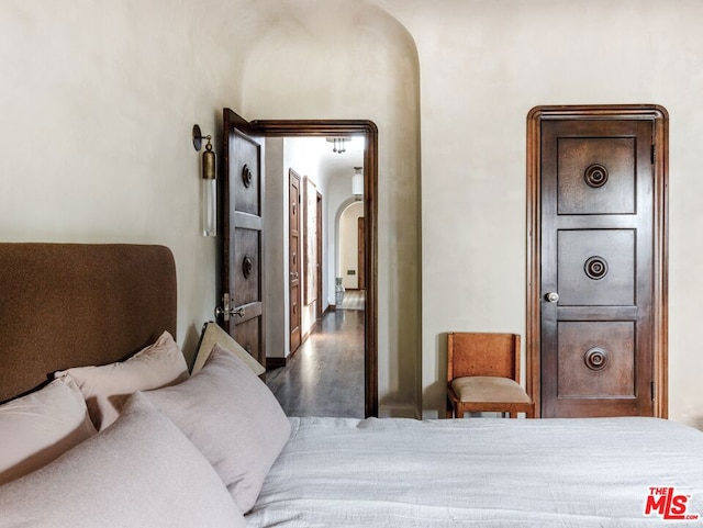 bedroom featuring dark hardwood / wood-style floors