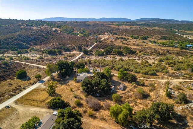 drone / aerial view featuring a mountain view