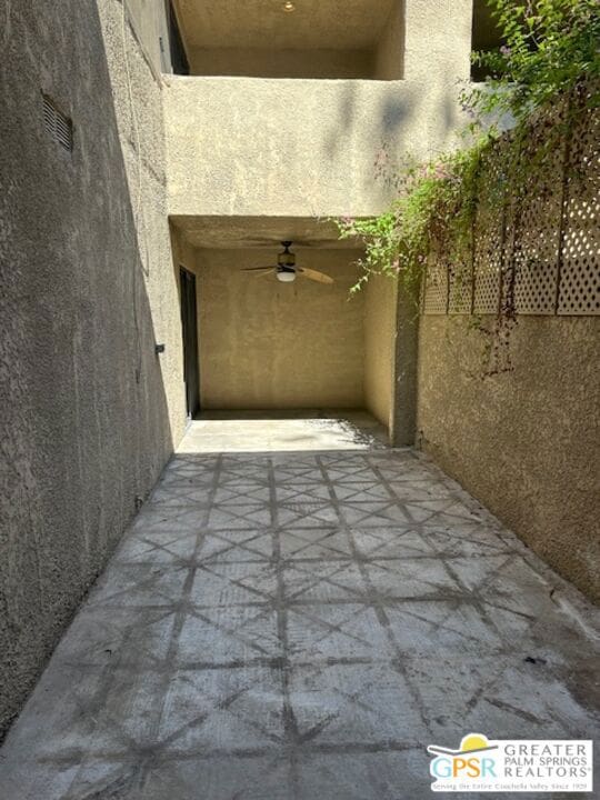 view of patio featuring ceiling fan