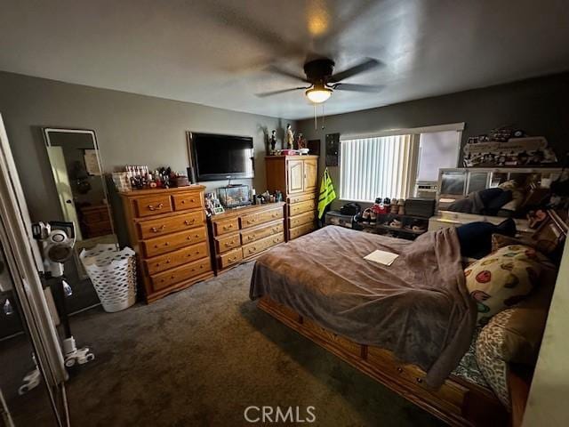 carpeted bedroom featuring a ceiling fan