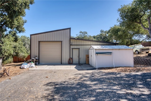 garage with wood walls