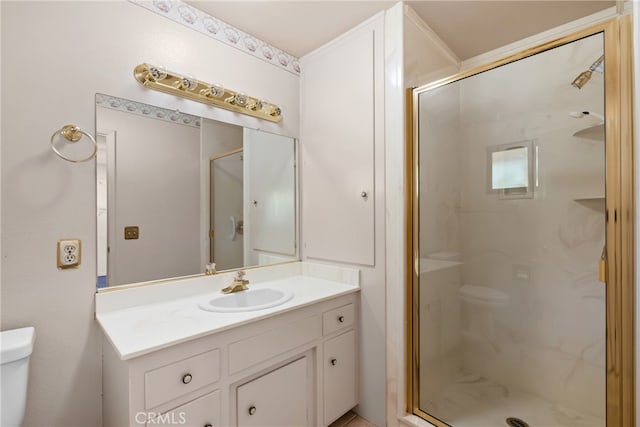 bathroom with walk in shower, vanity, and toilet