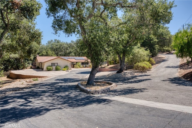 view of front of home featuring solar panels