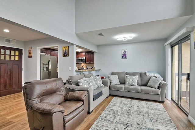 living room with light wood-type flooring