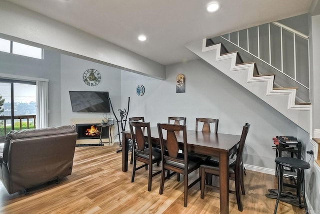 dining room with hardwood / wood-style flooring