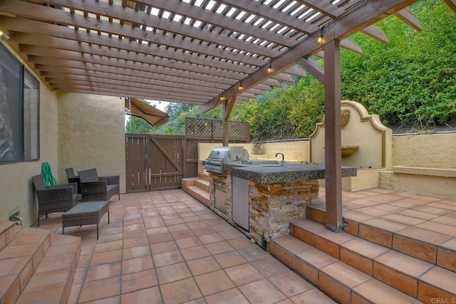 view of patio featuring a pergola and area for grilling