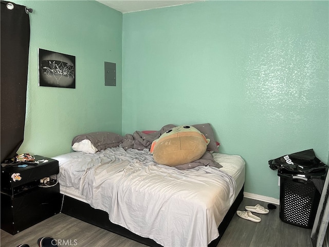 bedroom featuring wood-type flooring