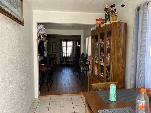 dining space featuring ceiling fan and light hardwood / wood-style flooring