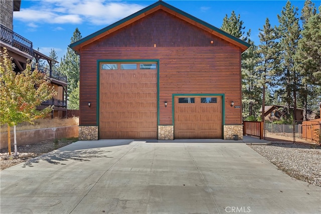 garage featuring fence