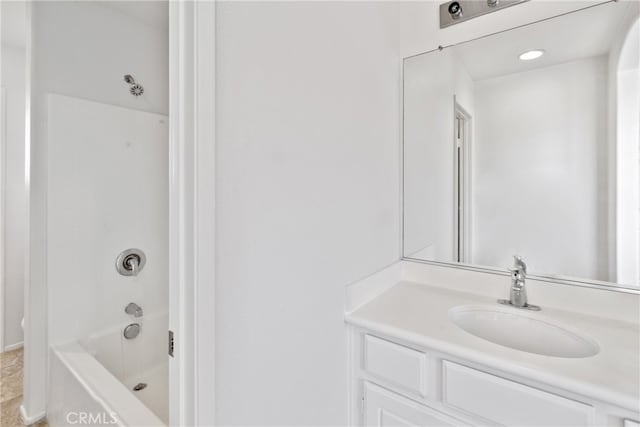 bathroom featuring vanity and tub / shower combination