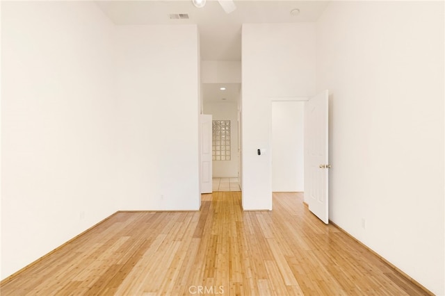 unfurnished room featuring light wood-type flooring