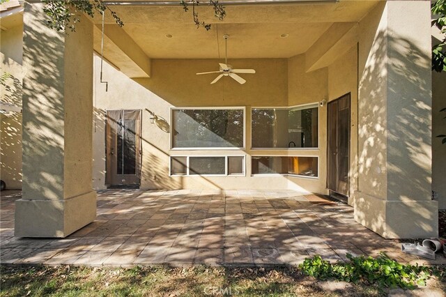 view of patio with ceiling fan