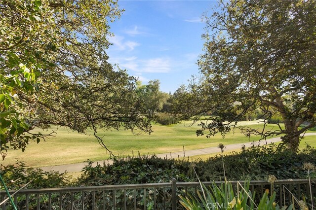 surrounding community featuring a lawn