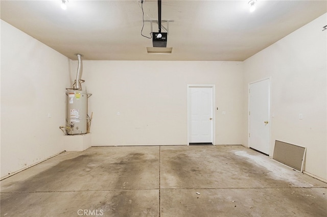 3185 Via Casita Pl, Chico, CA 95928 - garage featuring strapped water heater and a garage door opener