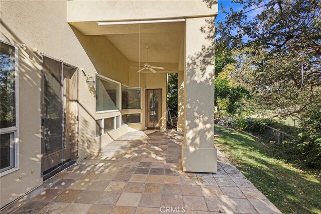 view of patio / terrace featuring ceiling fan