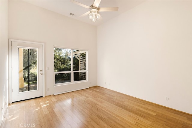 unfurnished room with light hardwood / wood-style floors and ceiling fan