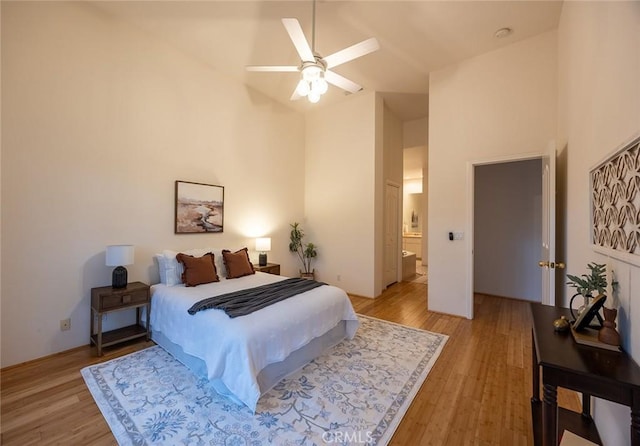 3185 Via Casita Pl, Chico, CA 95928 - bedroom with high vaulted ceiling, light wood-style floors, and ceiling fan
