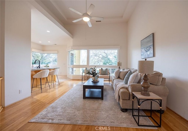 3185 Via Casita Pl, Chico, CA 95928 - living room with ceiling fan, wood finished floors, recessed lighting, and a high ceiling