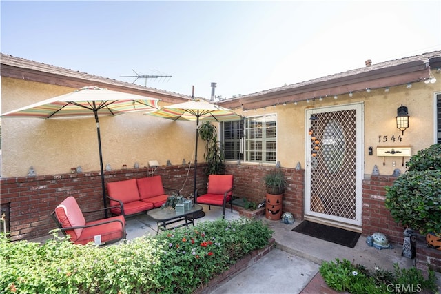 exterior space featuring an outdoor living space