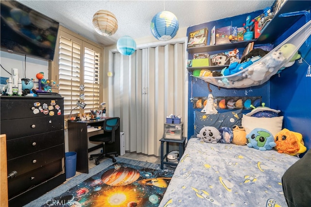 bedroom with a textured ceiling