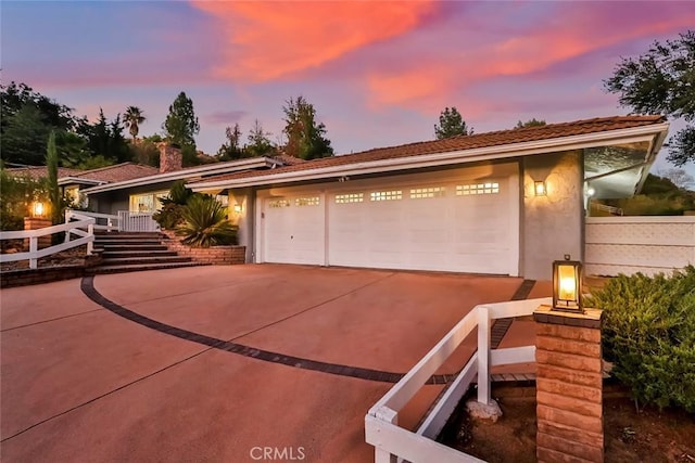 view of front of house with a garage