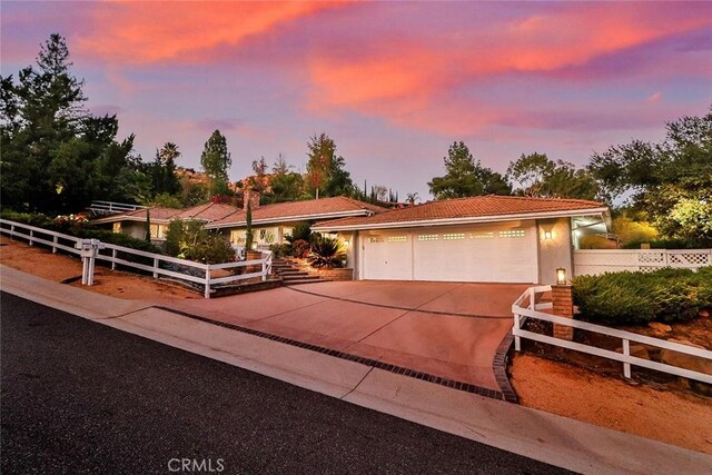 view of front of home with a garage