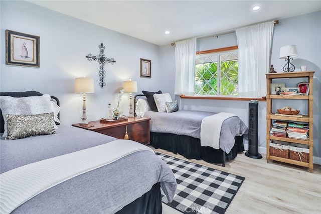 bedroom featuring light wood-type flooring