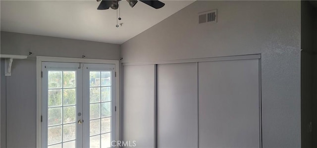 doorway to outside with french doors, vaulted ceiling, and ceiling fan