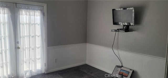 interior space with dark colored carpet