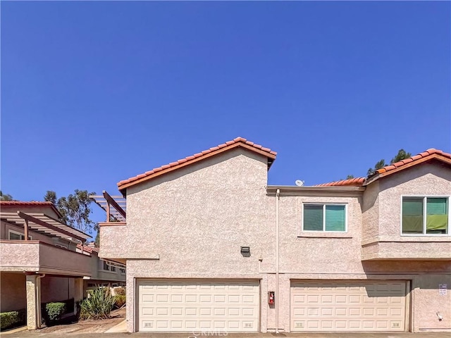 view of home's exterior with a garage