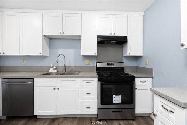 kitchen with sink, white cabinets, and stainless steel appliances