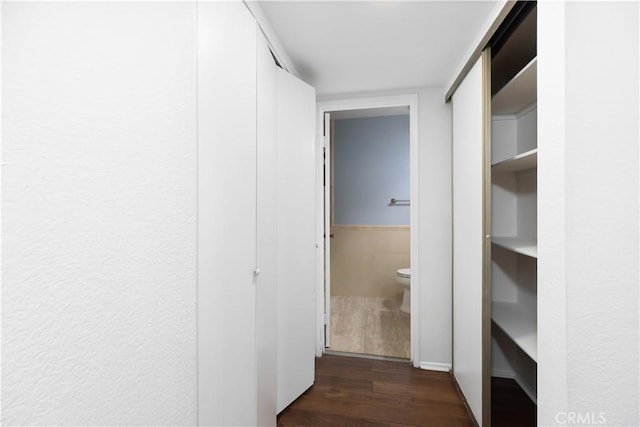 hall featuring dark hardwood / wood-style floors