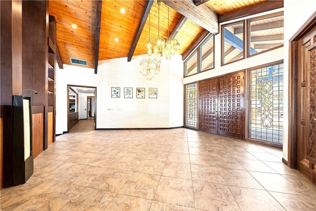 unfurnished room featuring an inviting chandelier, beamed ceiling, wood ceiling, and high vaulted ceiling