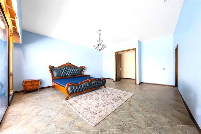 bedroom with a high ceiling and a notable chandelier