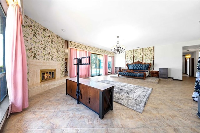 living room with a chandelier and a premium fireplace