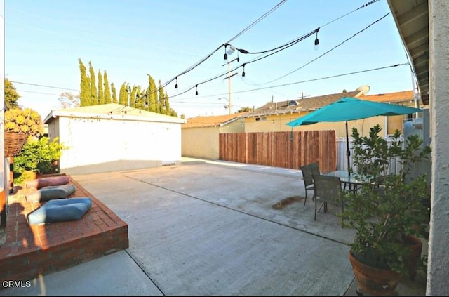 view of patio with an outdoor structure