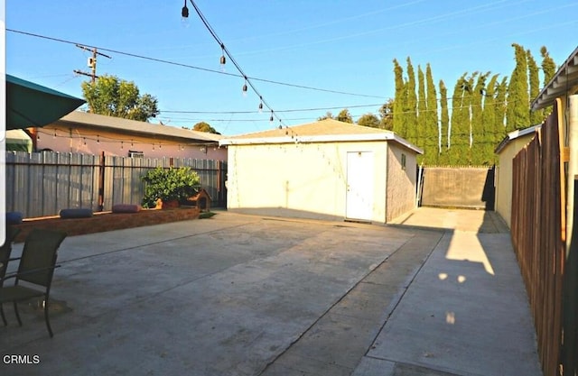 view of patio / terrace with a shed