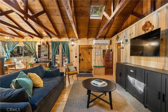 living room with vaulted ceiling with beams, wood ceiling, a wall mounted air conditioner, wooden walls, and light hardwood / wood-style floors