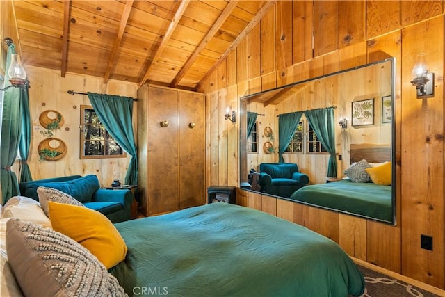 bedroom with wooden walls, wooden ceiling, lofted ceiling with beams, and carpet flooring