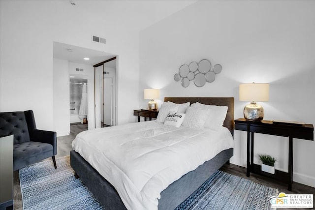 bedroom featuring dark hardwood / wood-style floors