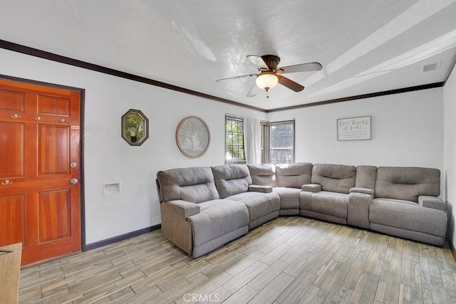 living room with ceiling fan, crown molding, and light hardwood / wood-style flooring