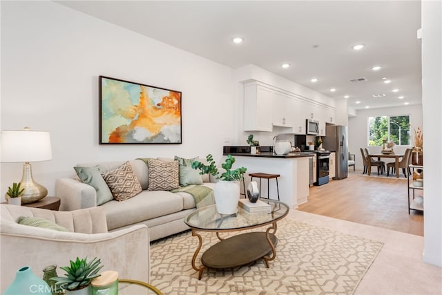 living room featuring light hardwood / wood-style flooring