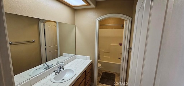 full bathroom with toilet, shower / washtub combination, and vanity